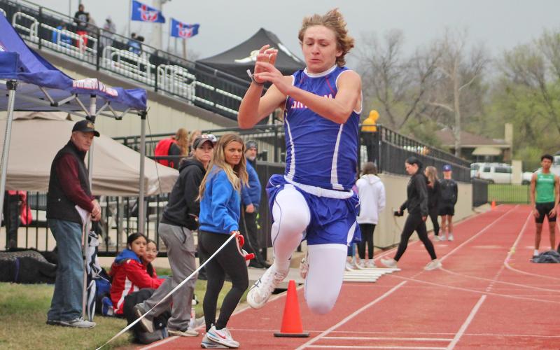 (TC GORDON | THE GRAHAM LEADER) Graham’s Andon Masterfield completes one of his triple jump attempts during the PK Relays last Saturday, March 16. The track meet ended up getting canceled due to heavy rains and lightning in the area.