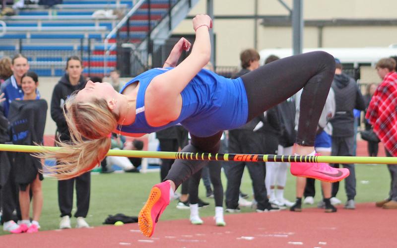 (TC GORDON | THE GRAHAM LEADER) Graham’s Braylee Mayes leaps over the bar during the high jump event of the PK Relays last Saturday, March 16. Only a handful of events were officially recorded due to the event getting canceled because of heavy rains.