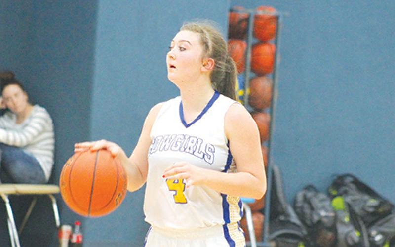 Bryson’s Hayle Leatherwood scored seven points Tuesday night as the Cowgirls defeated Throckmorton by a score of 35-33 to even their district record at 2-2.  Leader photo by Evan Grice