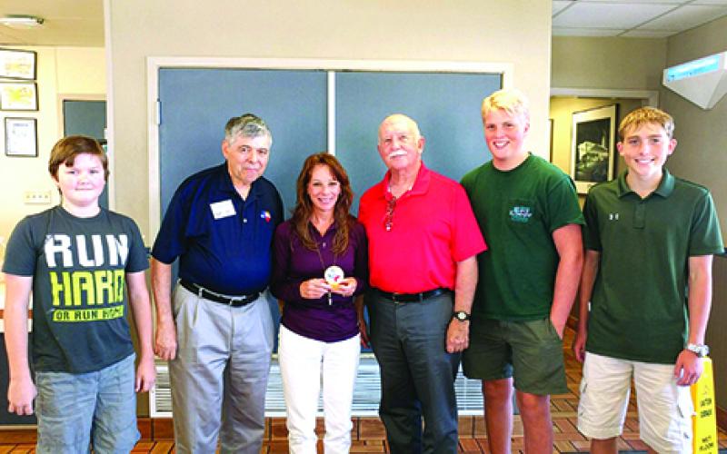  Mitzi Morrison (center) receives the Medal of Freedom Award which is awarded to chapter members who have shown enthusiasm and drive to support the Texas Air Force Associations objectives. Pictured with Morrison from left to right are Brayden Gipson, Dave Dietsch, Mike Winslow, Lats Hansson and Will Busey.