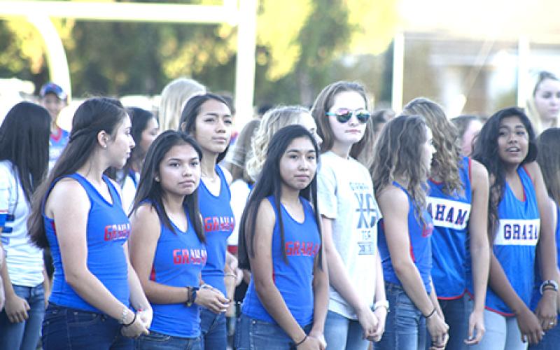 From left, Alicia Olvera, Lexi Fuentes, Maria Hernandez, Bailey Marshall and the rest of the Lady Blues cross country team was announced by their coach, Ky Graham, during the Booster Bash on Monday.	   
