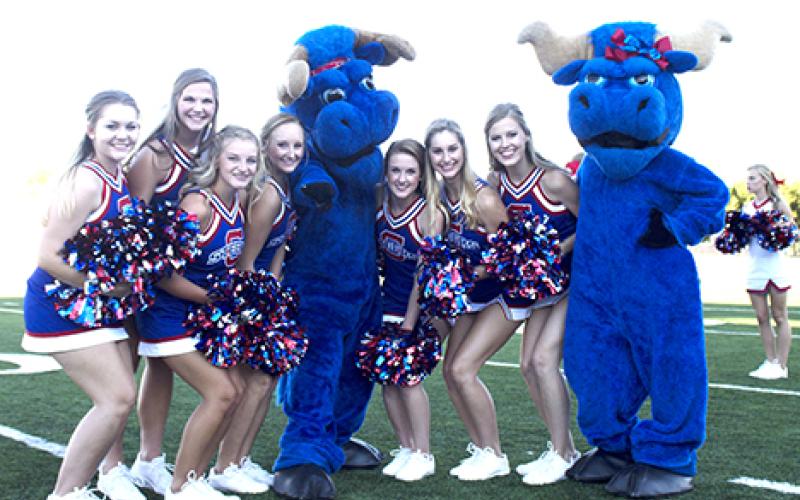 The Graham High School cheerleaders, along with the Ol’ Blue mascots posed during the Booster Bash. 