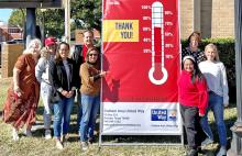 (CONTRIBUTED PHOTO | ISABEL SMITH) Members of Graham Area United Way pose as the organization reached 63% of their $100,000 goal at the beginning of November. The organization is currently over 75% of the way to the goal and is looking for more donations.