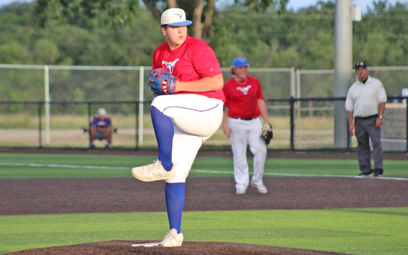 (TC GORDON | THE GRAHAM LEADER) Graham’s Tyson Louder goes through his windup on the mound and prepares to throw a pitch during the team’s summer league game Tuesday, June 11 against Jacksboro.