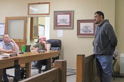 (TC GORDON | THE GRAHAM LEADER) Newcastle mayor Adrian Ontiveroz presents an issue about a damaged bridge affecting some of the town’s citizens to the Young County Commissioners Court at their meeting Monday, April 22. The city is looking for help in repairing the worn down bridge.