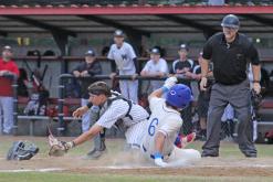 (TC GORDON | THE GRAHAM LEADER) Graham’s Tripp Mahaney slides into home plate to score a run while just beating the throw home during the Steers’ final game of the season. The Steers were fighting for a playoff spot but ended up with a 4-2 loss to end their year.