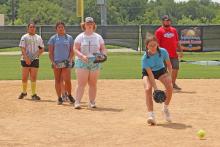 (THE GRAHAM LEADER | ARCHIVE PHOTO) The softball sixth through ninth grade camp held in summer 2023. Multiple camps will be occurring this year over a three-day period from May 28-30.