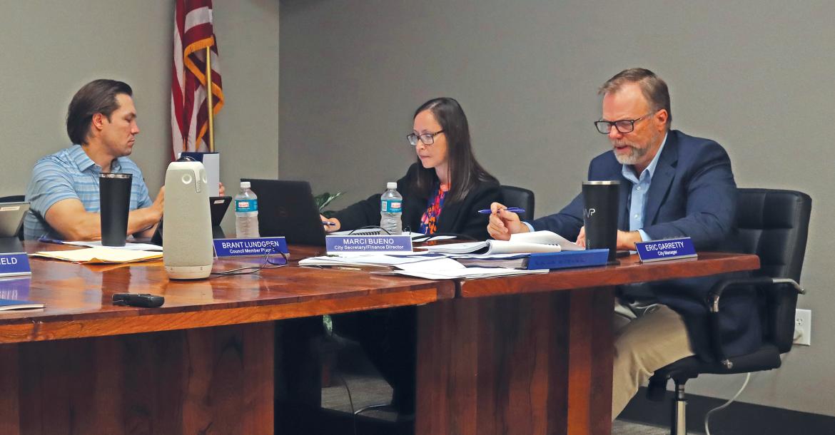(THOMAS WALLNER | THE GRAHAM LEADER) The Graham City Council approved a compressed work schedule for various city departments during their meeting Thursday, April 25. Shown from left to right are City Secretary and Finance Director Marci Bueno and City Manager Eric Garretty. 